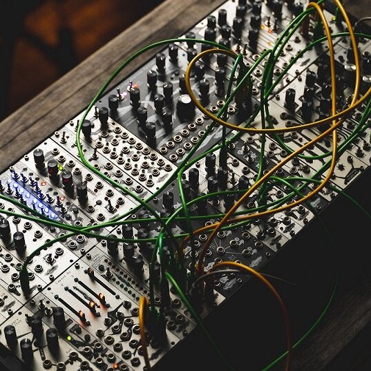 A densely-patched Eurorack system | Loops and beats sample pack from Ricky Tinez and Noise Engineering